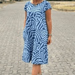 Nelia – Robe Fluide Imprimée à Col Rond Élégant